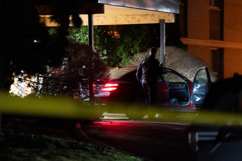 Toronto police at the scene of a fatal shooting on Bergamot Avenue in Rexdale late Sunday. Officers are continuing to canvass the area Monday to gather evidence. (Arlyn McAdorey/CBC - image credit)