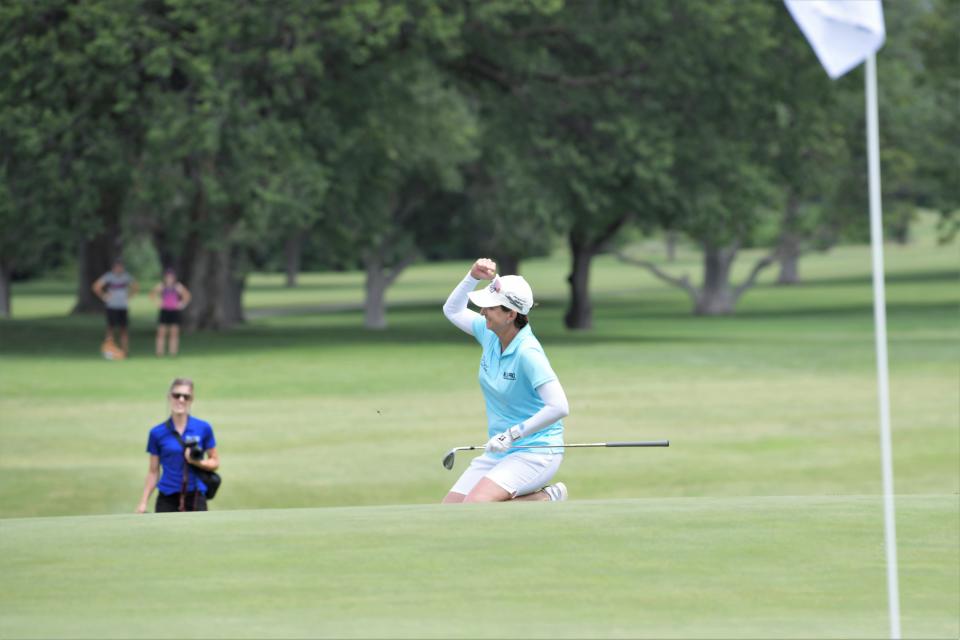 Senior LPGA golfer Karrie Webb celebrates after making the putt to put her in first during the Senior LPGA Championship on Sunday at the Salina Country Club.