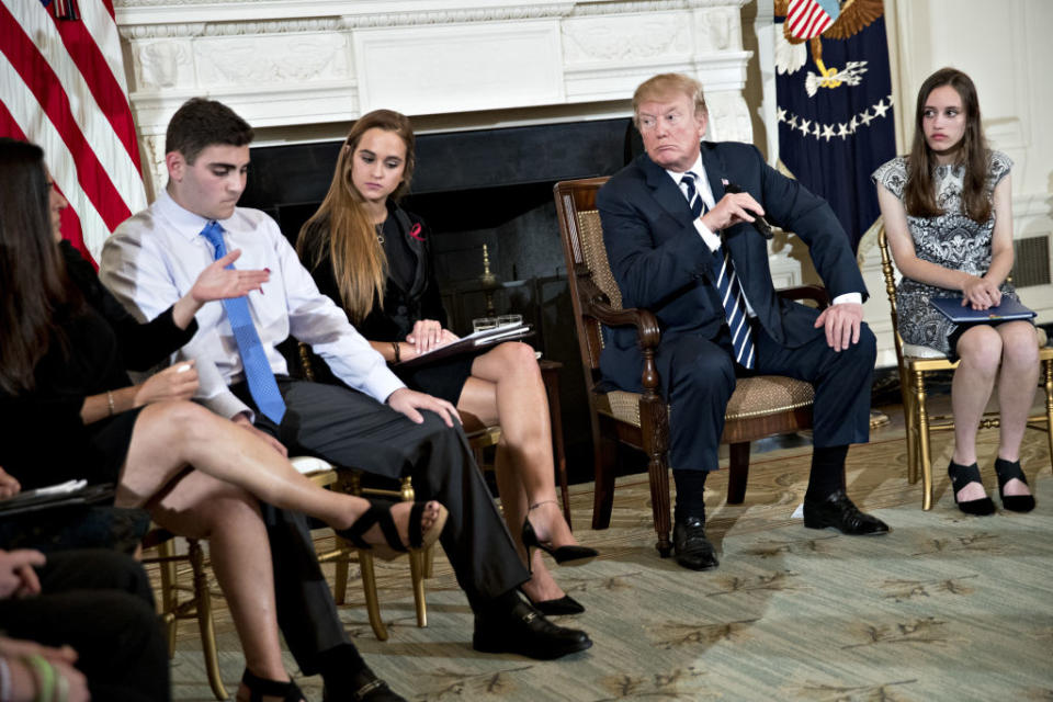 President Trump participates in a listening session on gun violence with high school students, teachers, and parents in the State Dining Room of the White House. (Photo: Andrew Harrer/Bloomberg)