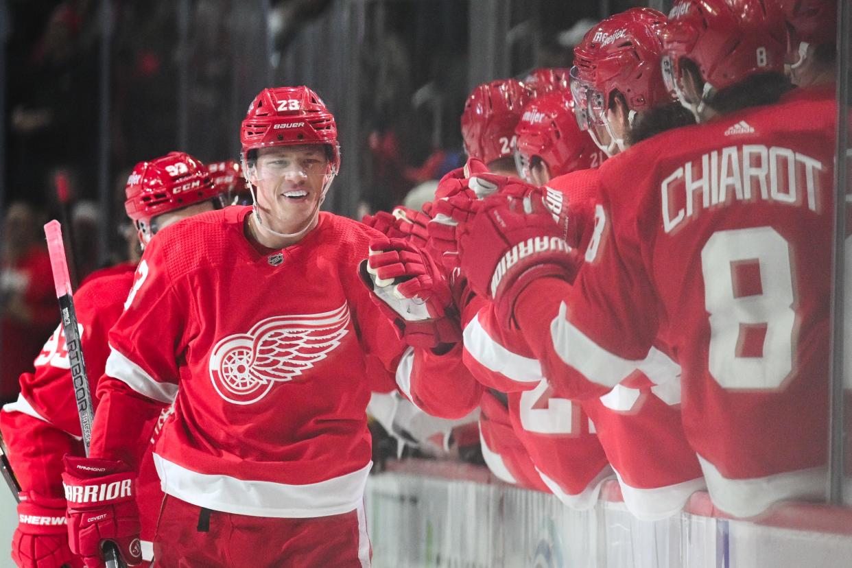 Detroit Red Wings left wing Lucas Raymond (23) celebrates his goal with teammates during the first period against the Boston Bruins at Little Caesars Arena in Detroit on Saturday, Nov. 4, 2023.