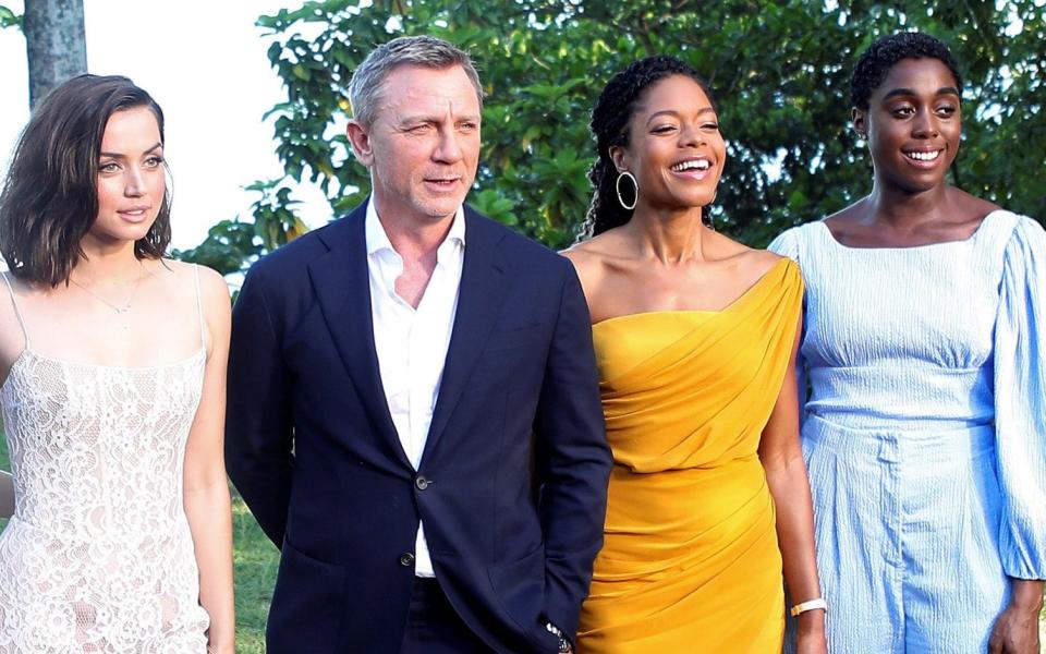 Ms Harris with Daniel Craig - Gilbert Bellamy/Reuters