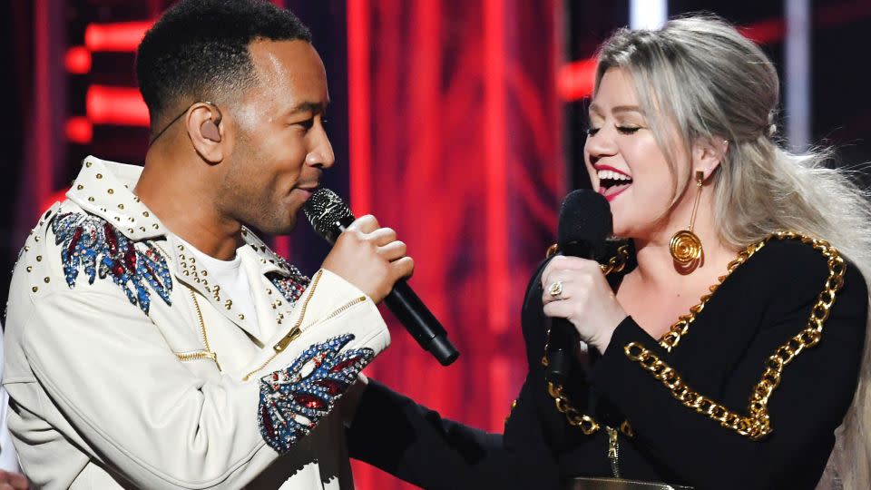 John Legend and Kelly Clarkson's modern remake of "Baby, It's Cold Outside" didn't exactly put the song's controversy to rest. - Kevin Winter/Getty Images