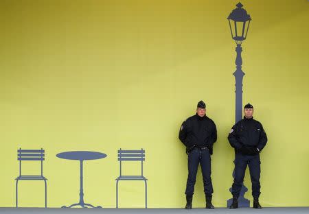 French police patrol near the entrance at the venue for the World Climate Change Conference 2015 (COP21) as tight security continues at Le Bourget, near Paris, France, December 1, 2015. REUTERS/Jacky Naegelen