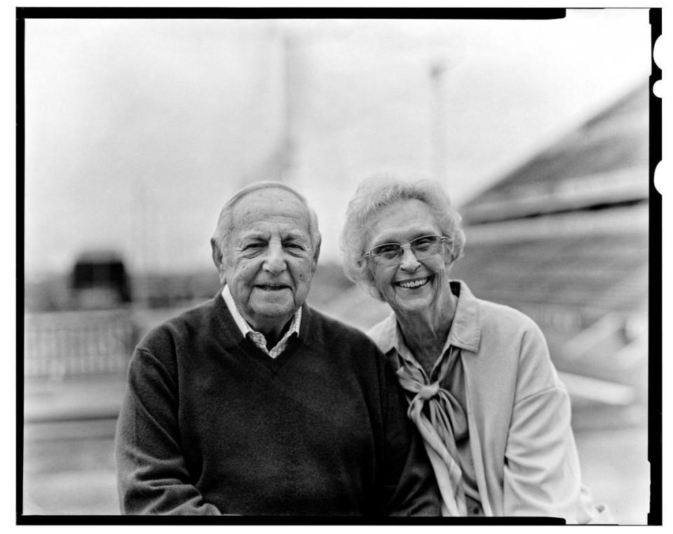 Former Eastern Kentucky football coach Roy Kidd and his wife, Sue, overlooking the field at Roy Kidd Stadium in 2021. The College Football Hall of Fame coach won 314 games in 39 years for the Colonels.