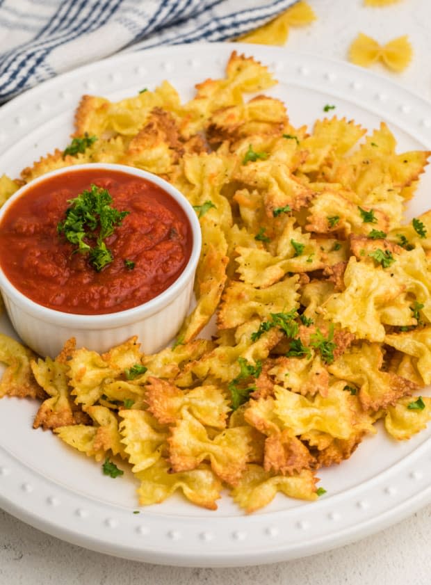 <p><a href="https://airfryingfoodie.com/air-fryer-pasta-chips/" rel="nofollow noopener" target="_blank" data-ylk="slk:Air Frying Foodie;elm:context_link;itc:0;sec:content-canvas" class="link ">Air Frying Foodie</a></p>