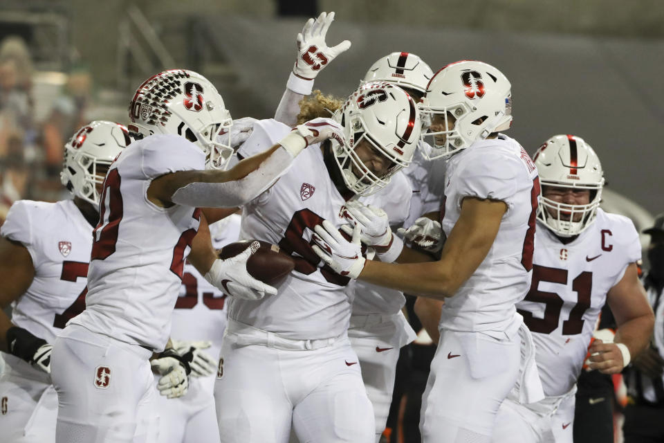 Stanford tight end Tucker Fisk (88) celebrates with teammates after scoring a touchdown during the first half of the team's NCAA college football game against Oregon State in Corvallis, Ore., Saturday, Dec. 12, 2020. (AP Photo/Amanda Loman)