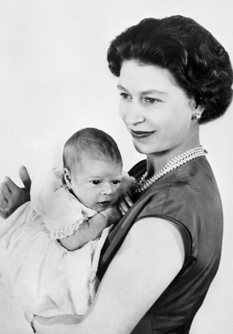 <div class="inline-image__caption"><p>A young queen with newborn Prince Andrew in 1960. </p></div> <div class="inline-image__credit">AFP via Getty</div>