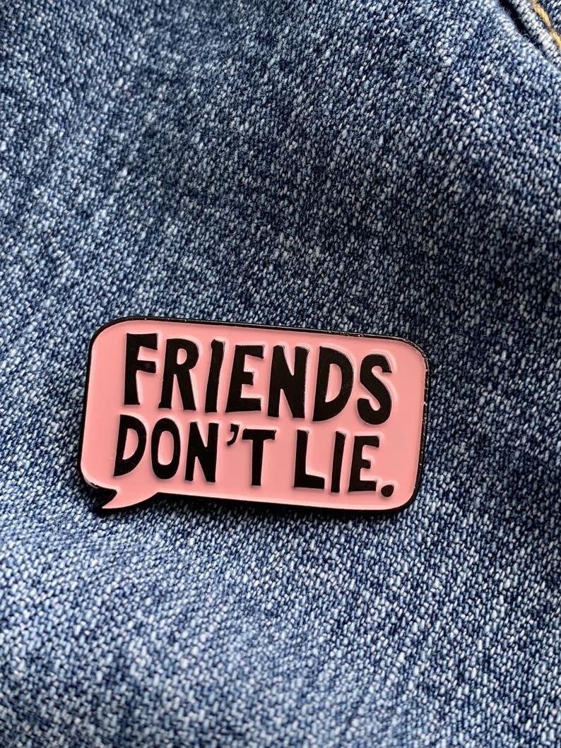 23) Enamel pin quote