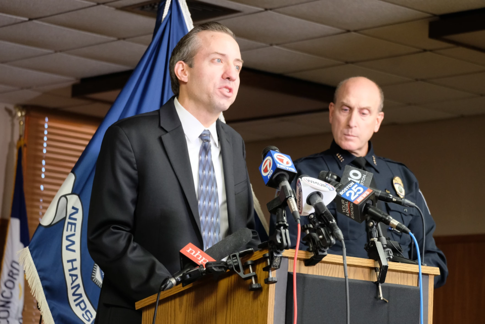 In this NHPR file photo, John Formella and Concord Police Chief Bradley Osgood speak at a press conference earlier this year.