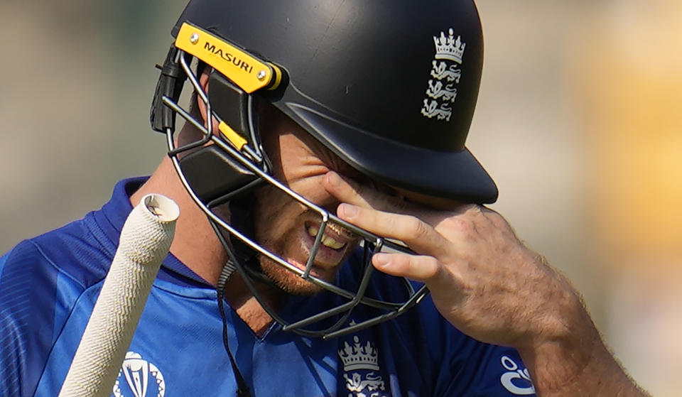 England's captain Jos Butler leaves the ground after losing his wicket during the ICC Men's Cricket World Cup match between England and Sri Lanka in Bengaluru, India, Thursday, Oct. 26, 2023. (AP Photo/Aijaz Rahi)