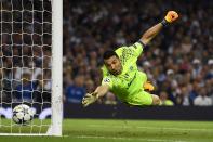 <p>CARDIFF, WALES – JUNE 03: Gianluigi Buffon of Juventus dives but fails to stop Casemiro of Real Madrid (not pictured) shot from going in for Real Madrid second goal during the UEFA Champions League Final between Juventus and Real Madrid at National Stadium of Wales on June 3, 2017 in Cardiff, Wales </p>