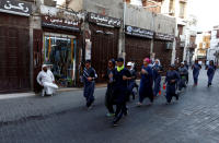 <p>Women run during an event marking International Women’s Day in Old Jeddah, Saudi Arabia, March 8, 2018. (Photo: Faisal Al Nasser/Reuters) </p>