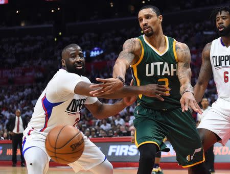 Apr 30, 2017; Los Angeles, CA, USA; Los Angeles Clippers guard Raymond Felton (2) defends a pass by Utah Jazz guard George Hill (3) in the second period of game seven of the first round of the 2017 NBA Playoffs at Staples Center. Mandatory Credit: Jayne Kamin-Oncea-USA TODAY Sports