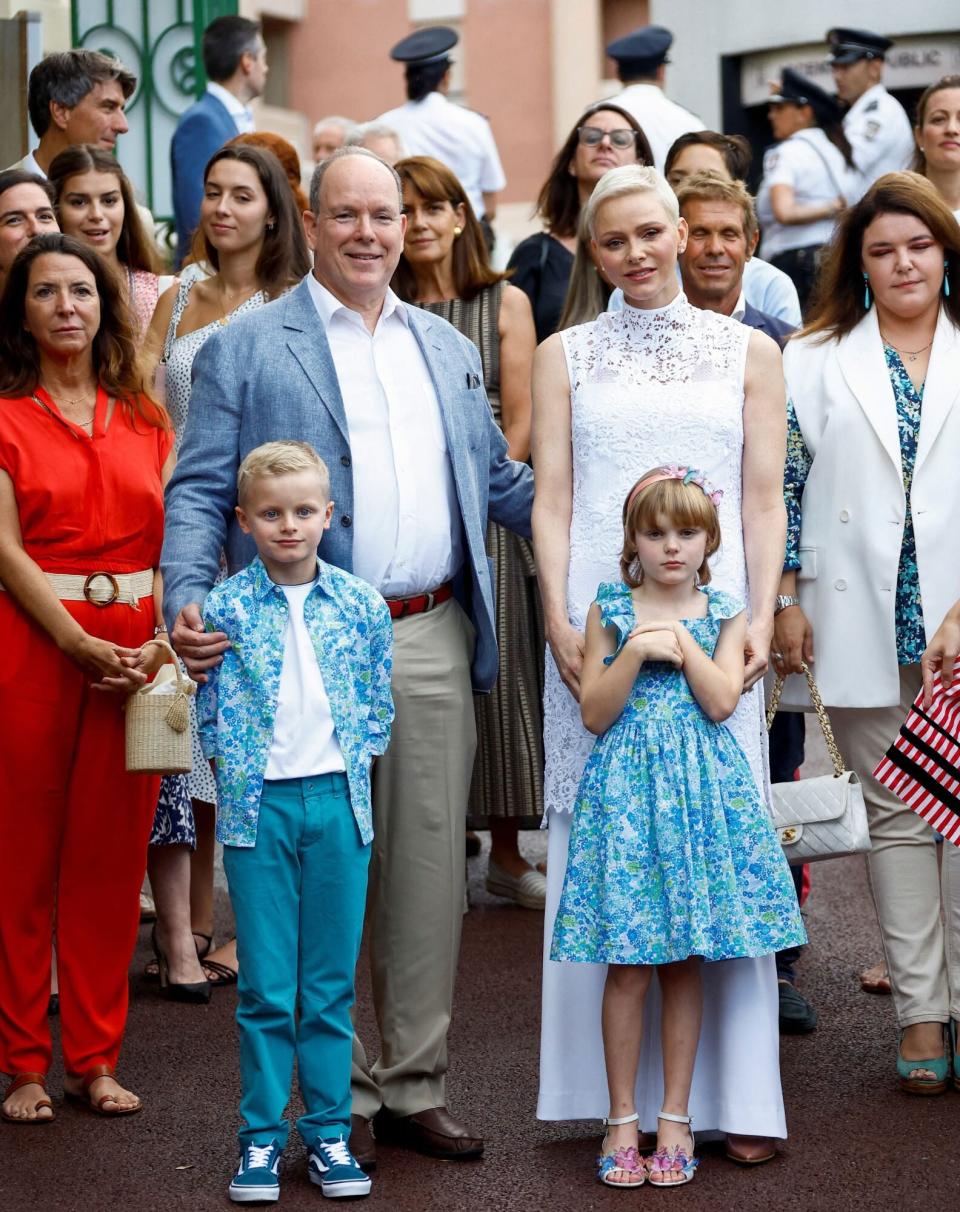 Prince Albert II (2nd L), Princess Charlene (R), Prince Jacques (L), and Princess Gabriella (2nd R) of Monaco arrive to take part in the traditional "U Cavagnetu" Monaco picnic, in Monaco, September 3, 2022. (Photo by ERIC GAILLARD / POOL / AFP) (Photo by ERIC GAILLARD/POOL/AFP via Getty Images)