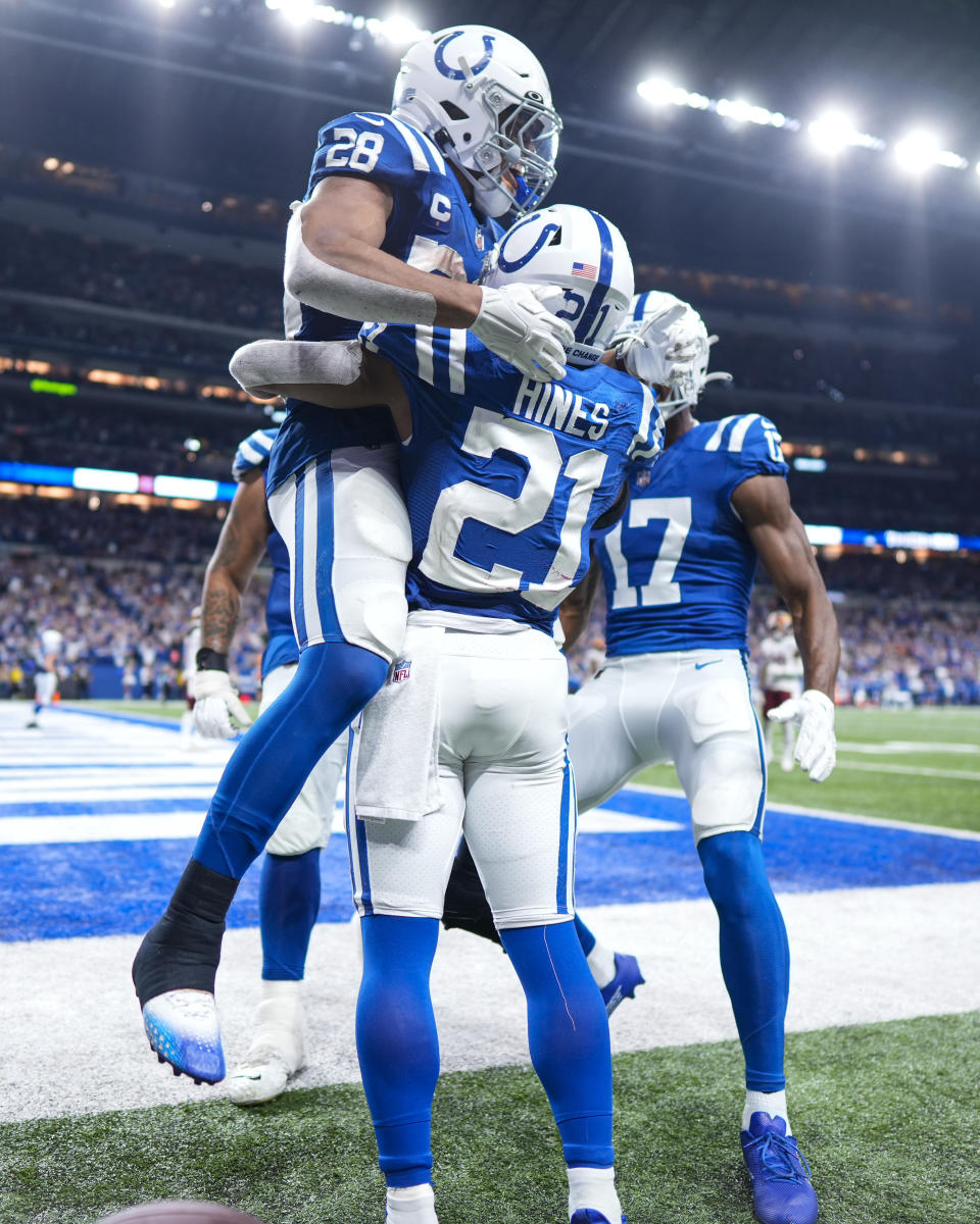 Indianapolis Colts running back Nyheim Hines (21) celebrates a touchdown against the Washington Commanders in the second half of an NFL football game in Indianapolis, Fla., Sunday, Oct. 30, 2022. (AP Photo/AJ Mast)