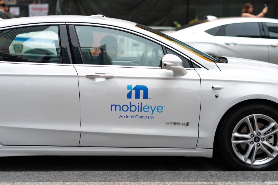 Mobileye driverless car logo is seen on a vehicle at the Nasdaq Market site in New York, U.S., July 20, 2021. REUTERS/Jeenah Moon - RC2IOO98FRZ6