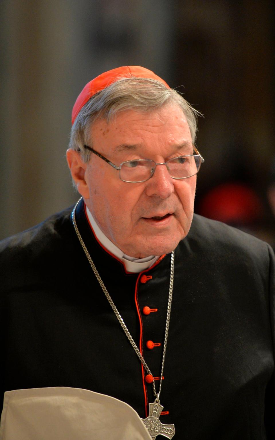 Cardinal George Pell arrives to attend a mass for Maundy Thursday in April 2015 at St Peter's basilica in Vatican - Credit: AFP