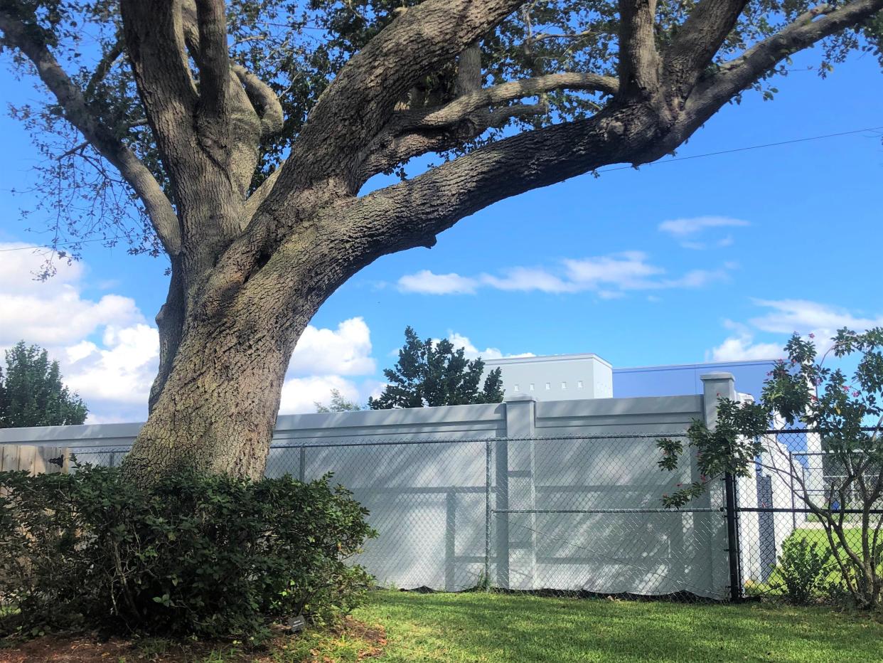 The school district built an $140,000 concrete wall around Addison Mizner School in Boca Raton to appease residents concerned about noise from children playing outdoors.