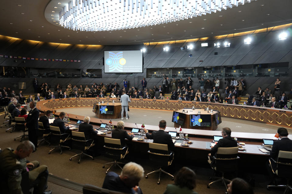 A general view of a meeting of the NATO-Ukraine council in defense ministers format at NATO headquarters in Brussels, Thursday, June 13, 2024. NATO defense ministers gathered Thursday hoping to agree on a new plan to provide long-term security assistance and military training to Ukraine, after Hungary promised not to veto the scheme as long as it's not forced to take part. (AP Photo/Virginia Mayo)