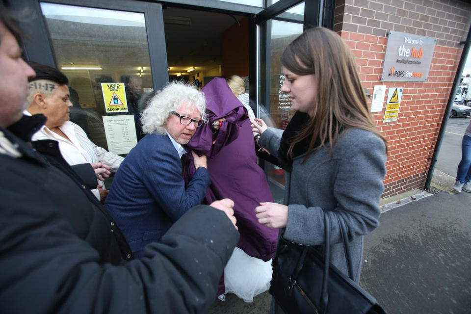 Charles Bronson's bride Paula Williamson arrives at jail under purple cloak ahead of wedding