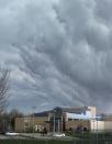 Storm clouds build over the scene of a shooting at the Jewish Community Center of Greater Kansas City in Overland Park, Kansas April 13, 2014. (REUTERS/Dave Kaup)