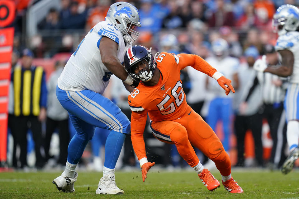 Denver Broncos outside linebacker Von Miller (58) spins arounds Detroit Lions offensive tackle Tyrell Crosby during the second half of an NFL football game, Sunday, Dec. 22, 2019, in Denver. (AP Photo/Jack Dempsey)