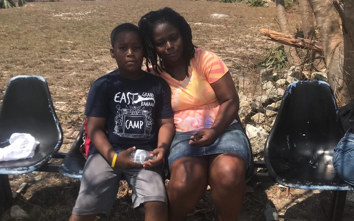 Lanell Laing and her son Aaron Turner spent the night clinging on for their lives with their heads pressed against the ceiling as waters surged into High Rock, Grand Bahama - Hayley Dixon for The Telegraph 