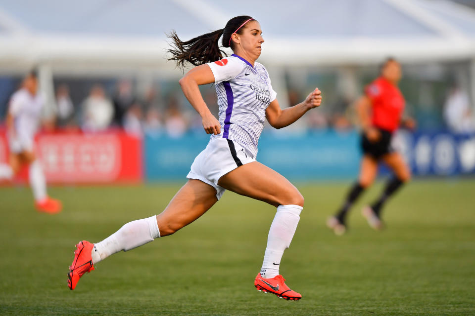 Alex Morgan #13 of Orlando Pride chases down the ball during the match against the Seattle Reign FC at Memorial Stadium in Seattle, Washington in 2019. (Photo: Alika Jenner/Getty Images)