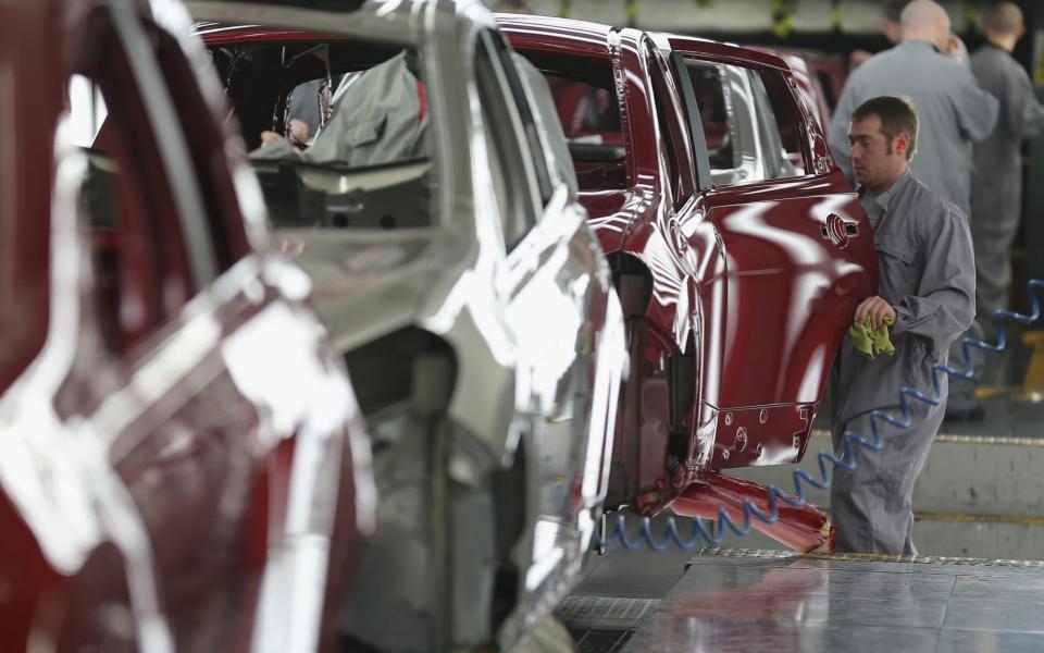 A worker at Nissan's giant plant in Sunderland - Getty Images Europe