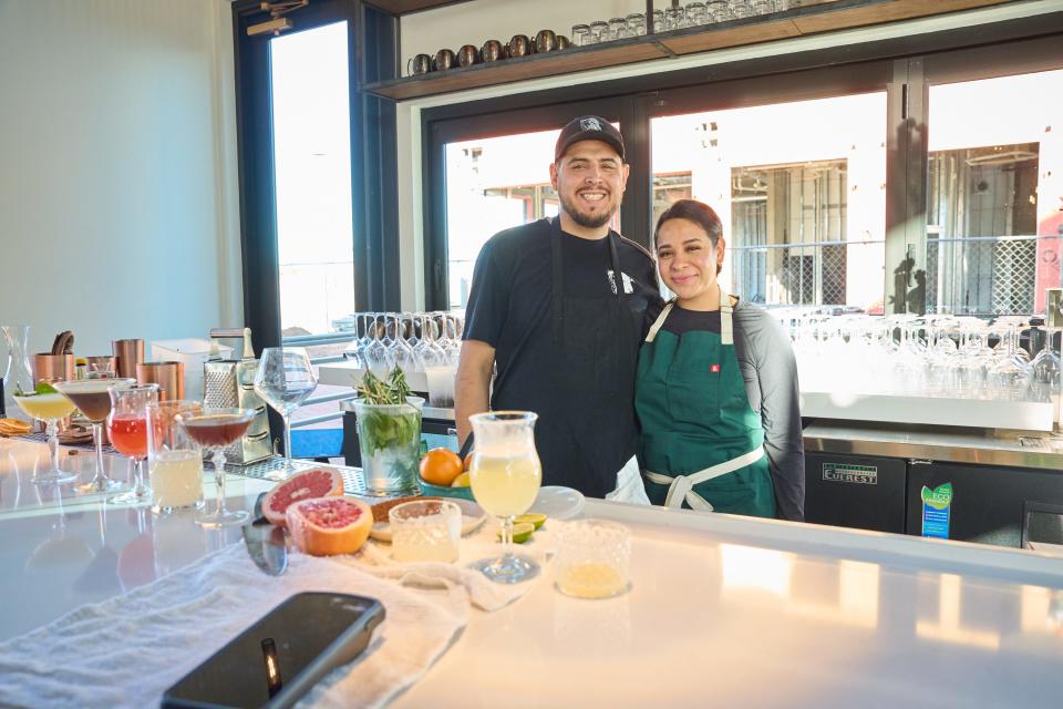 Feb 2, 2023; Tempe, AZ, United States; Husband and wife Armando Hernandez, left, and Nadia Holguin pose for a photo at Cocina Chiwas in Culdesac Tempe on Thursday. Feb. 2, 2023. Mandatory Credit: Alex Gould/The Republic