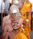 Novice Buddhist monks attend a Vesak Day ceremony at the Udong mountain in Kandal province May 5, 2012. Buddhists in Cambodia celebrate Vesak Day to honour the birth, enlightenment and death of Buddha. REUTERS/Samrang Pring