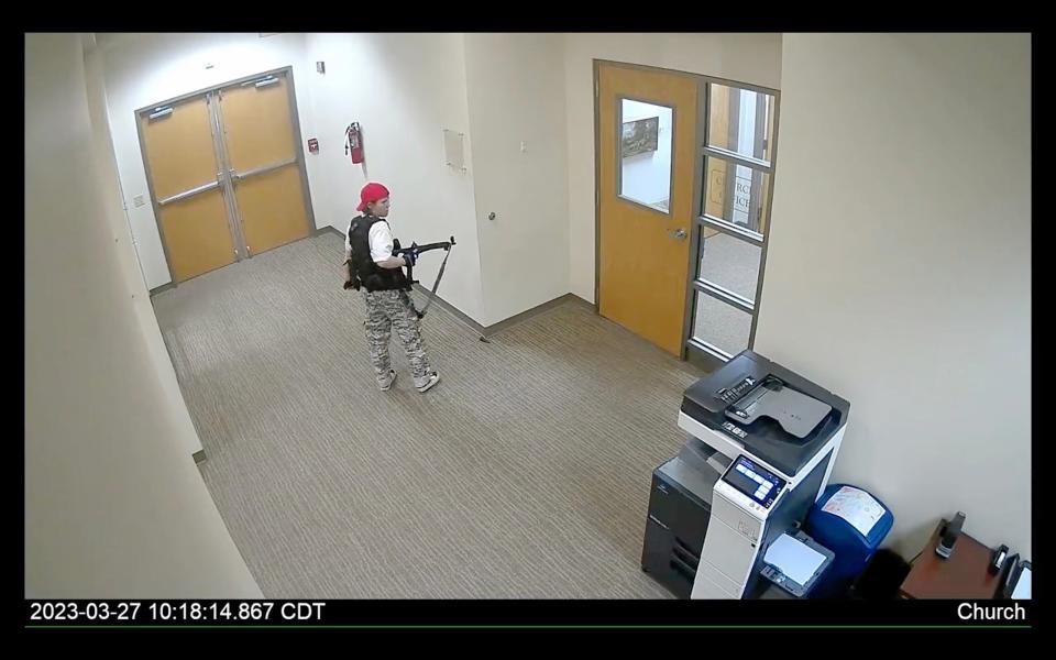 A grab from surveillance video released by police shows the shooter during the attack on the Covenant School in Nashville (EPA)