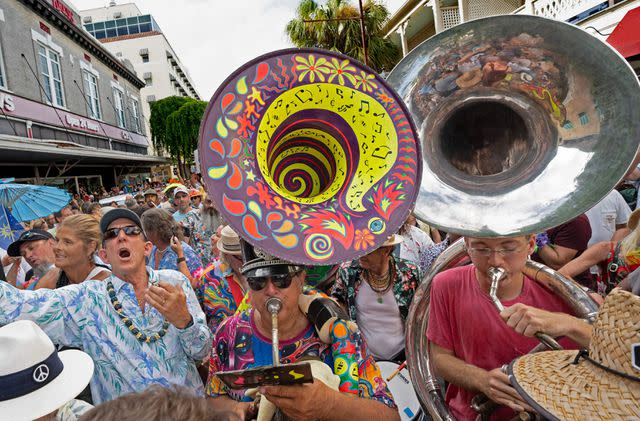 <p>ROB O'NEAL/Florida Keys News Bureau/AFP via Getty</p> Jimmy Buffett parade in Key West