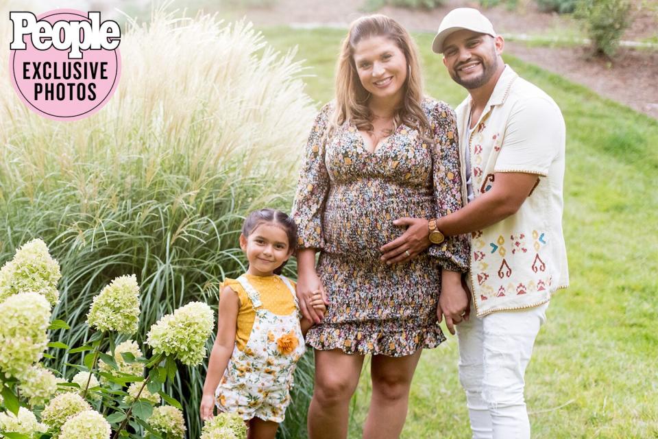 Frank Ray and wife with child