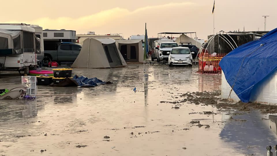 Mud fills a Burning Man campsite after heavy rain in Nevada's Black Rock Desert on September 1, 2023. - Andrew Hyde