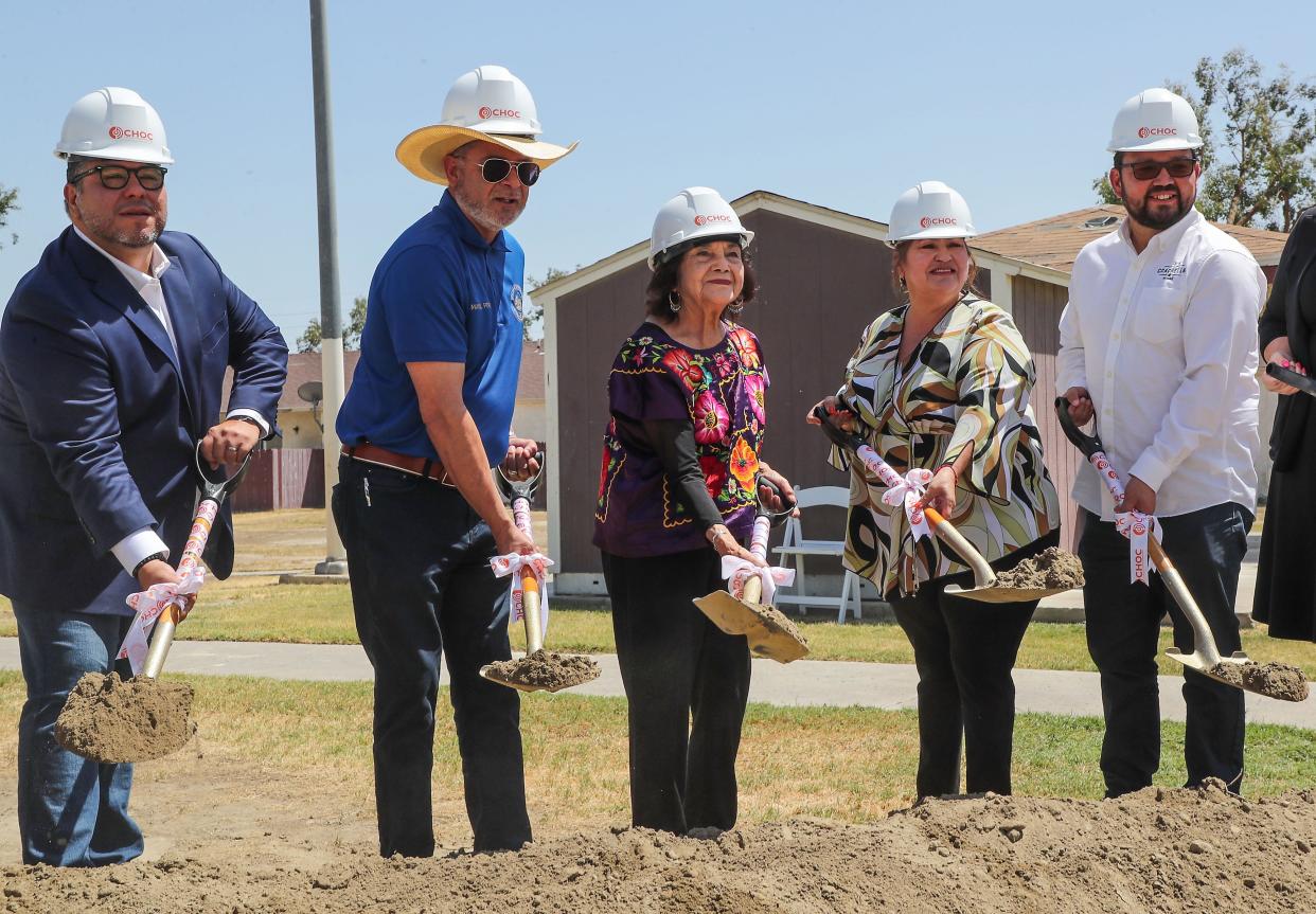 From left, Eduardo Garcia, V. Manuel Perez, Dolores Huerta, Josephine Gonzalez and Steven Hernandez officially break ground on the Placita Dolores Huerta affordable housing complex in Coachella, Calif., on April 29, 2022.