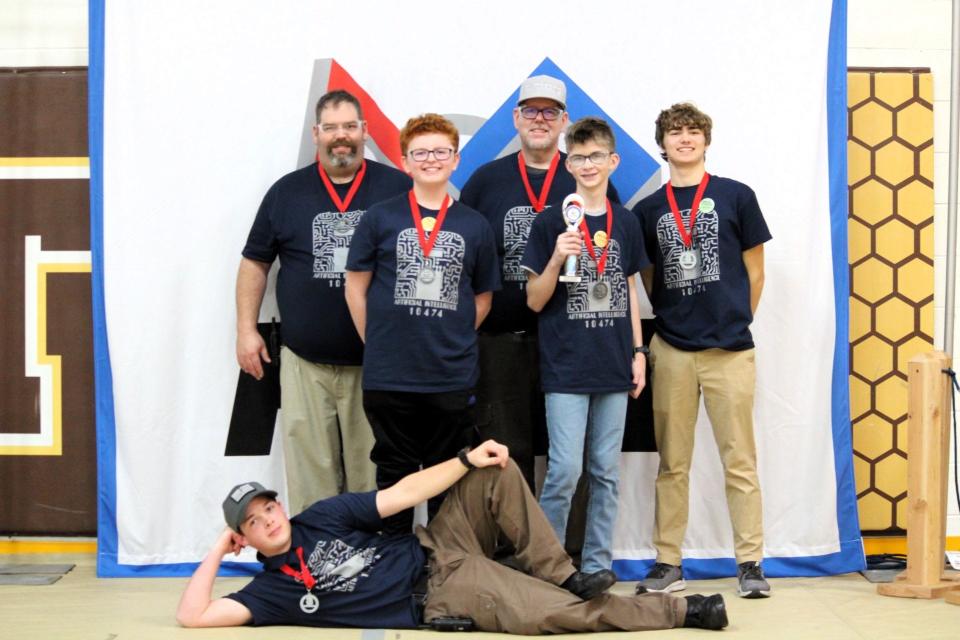 The Pellston FTC Team, Artificial Intelligence, poses after winning the qualifier competition.