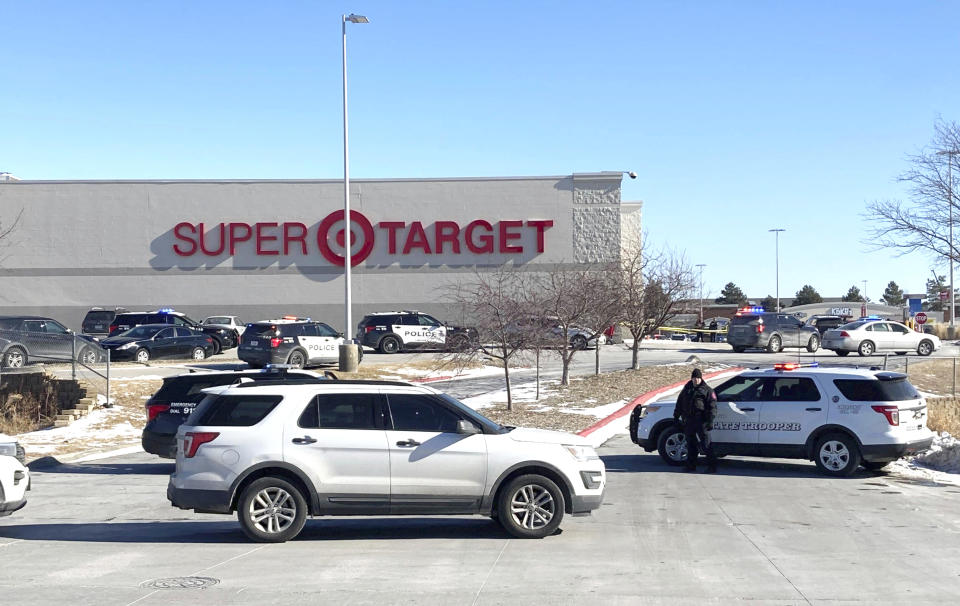 Police officers gather outside a Target store in Omaha, Neb. (Josh Funk / AP)