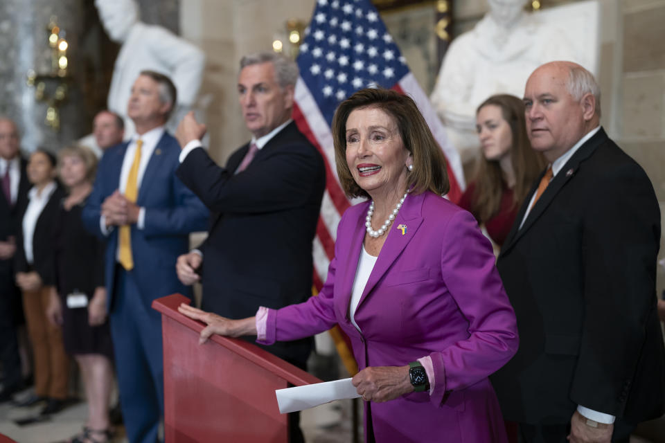 House Speaker Nancy Pelosi, D-Calif., hosts the dedication and unveiling ceremony of a statue in honor of Amelia Earhart, one of the world's most celebrated aviators and the first woman to fly solo across the Atlantic Ocean, in Statuary Hall, at the Capitol in Washington, Wednesday, July 27, 2022. The statue of Amelia Earhart will represent the State of Kansas in the National Statuary Hall Collection. (AP Photo/J. Scott Applewhite)