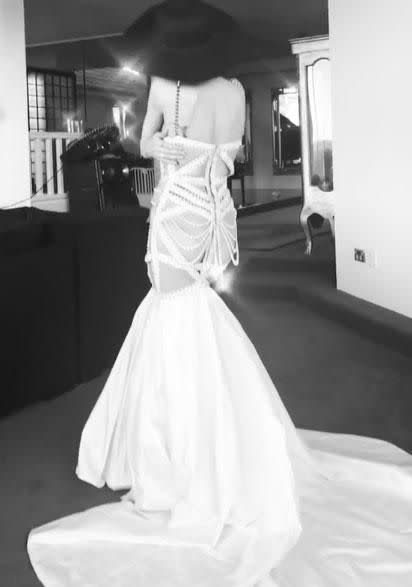 Not afraid to flash the flesh, she proudly posed with her back to the camera, showing off the floor-length gown which was practically backless itself, with cut-outs featured right down the back. Source: Instagram