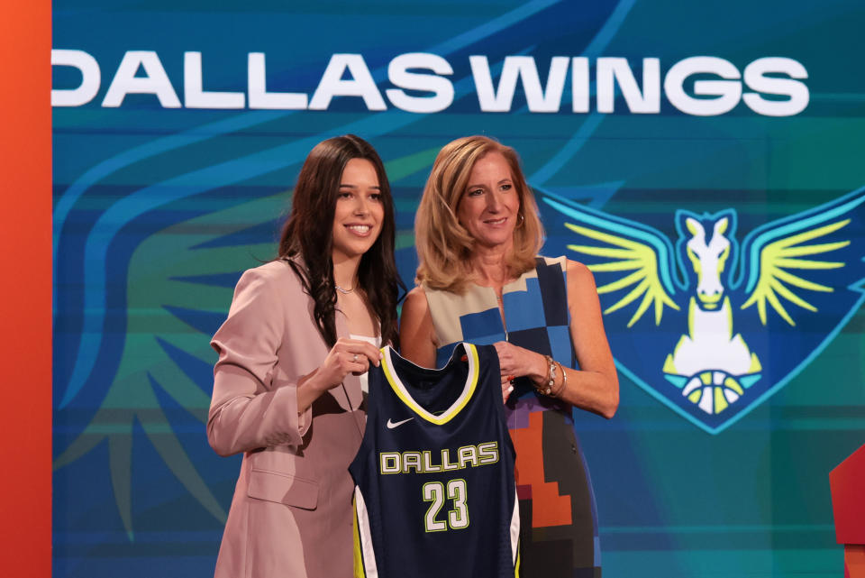 Lou Lopez Sénéchal poses for a photo with WNBA commissioner Cathy Engelbert after being drafted fifth overall by the Dallas Wings during WNBA Draft 2023 at Spring Studios in New York City on April 10, 2023. (Vincent Carchietta/USA TODAY Sports)