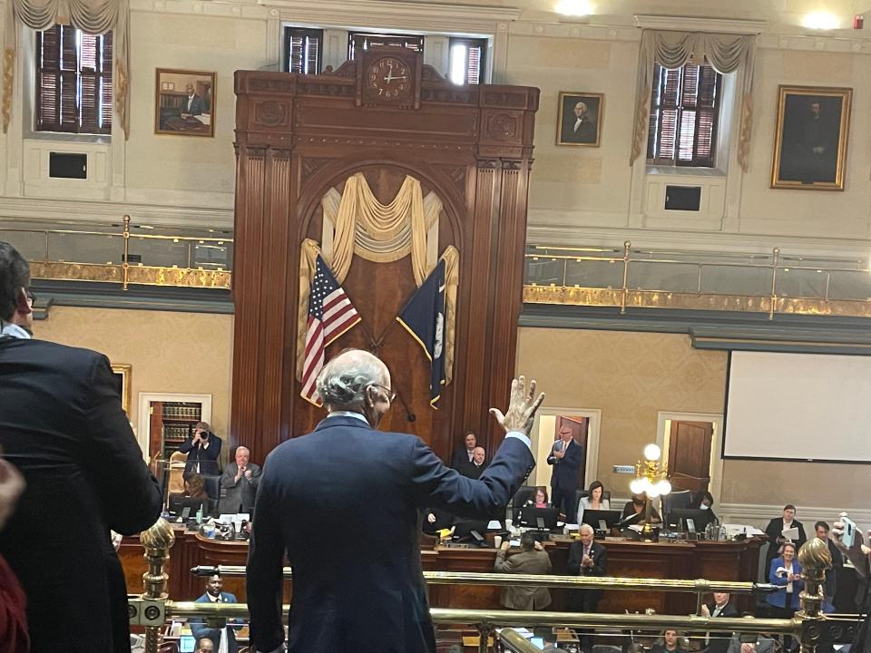 Gary Hill waves at members of the General Assembly after his election to the Supreme Court bench