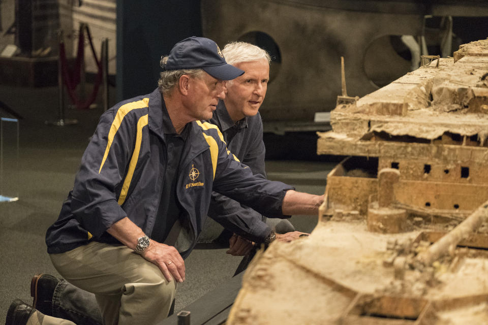 Oceanographer Bob Ballard and James Cameron study a scale model of the RMS Titanic in the documentary, 'Titanic: 20 Years Later with James Cameron.' (Photo: National Geographic/Mark Fellman)