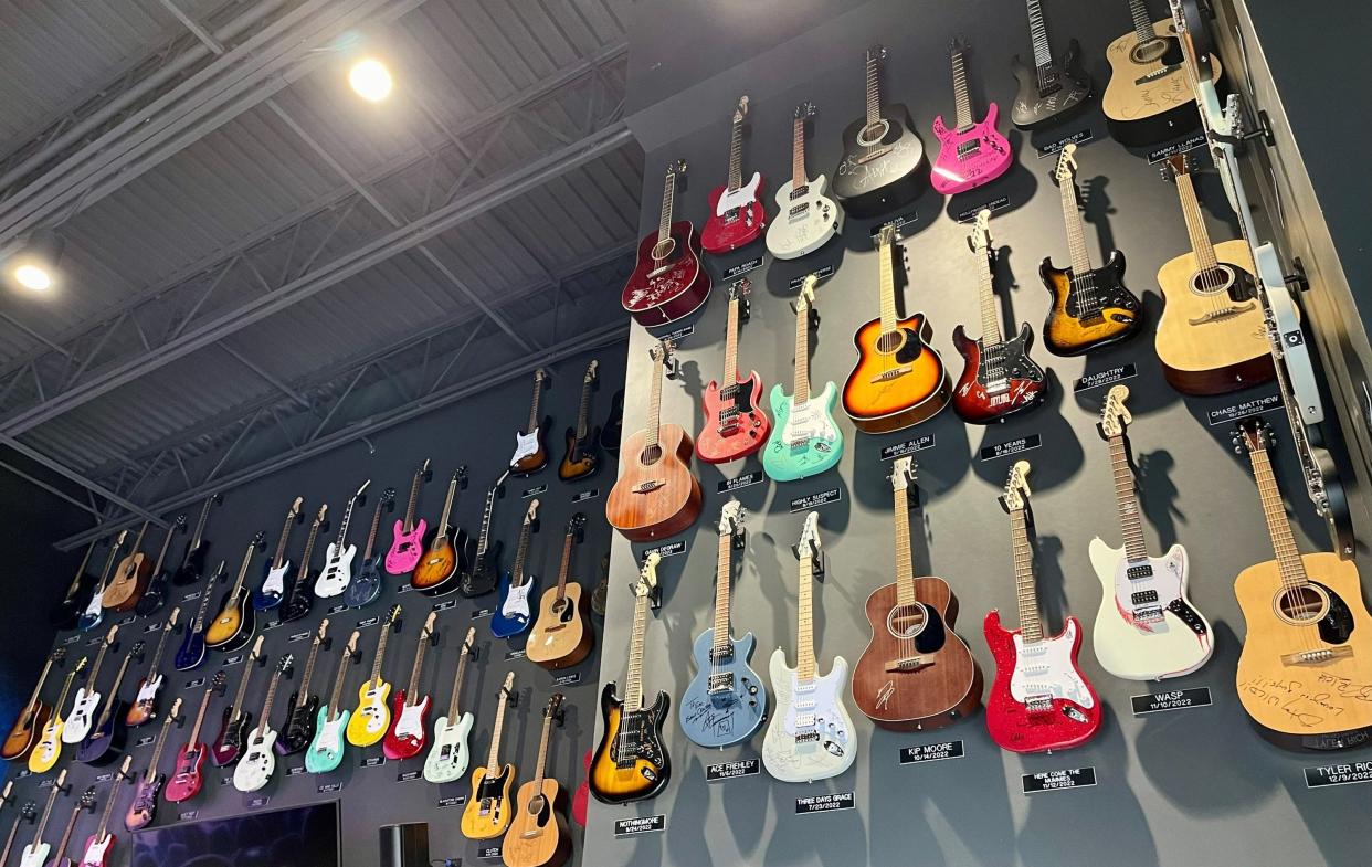 There are 82 signed guitars and counting on the walls of the lobby of the EPIC Event Center in Ashwaubenon. Each one represents an act who has played the music venue since it opened in 2021.