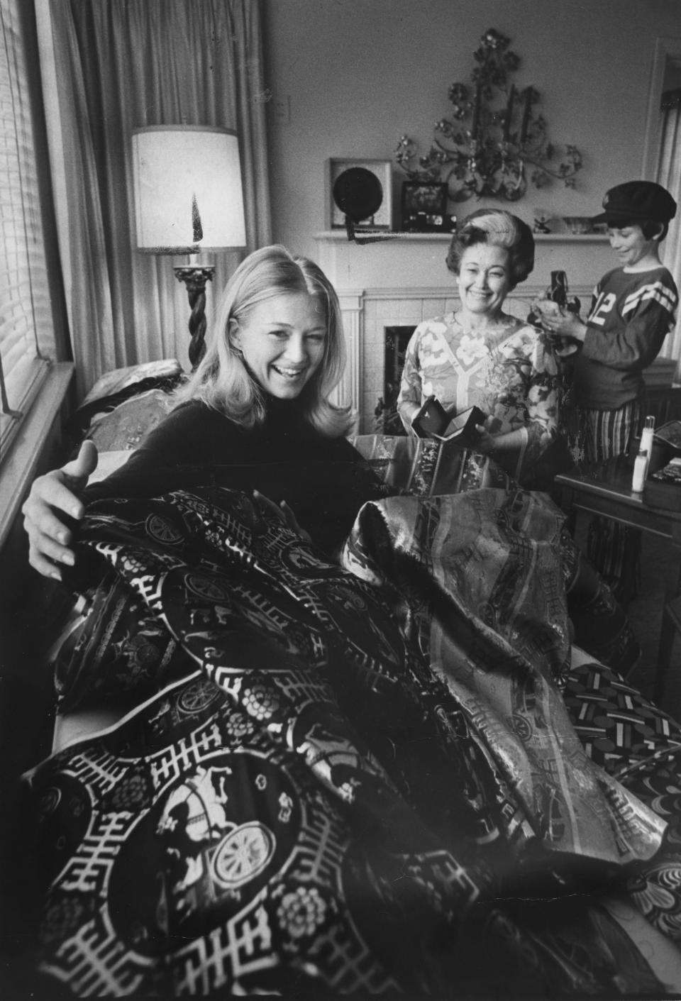 Diane Sawyer, then executive assistant secretary to presidential press secrectary Ron Ziegler, showed her mother Jean, and her cousin, Whitney Jones, some of the purchases she made while in China. March 3, 1972