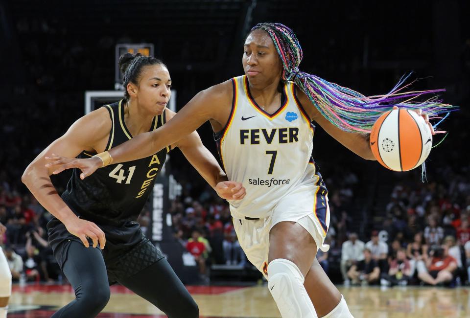 LAS VEGAS, NEVADA - JUNE 24: Aliyah Boston #7 of the Indiana Fever drives against Kiah Stokes #41 of the Las Vegas Aces in the second quarter of their game at Michelob ULTRA Arena on June 24, 2023 in Las Vegas, Nevada. The Aces defeated the Fever 101-88.