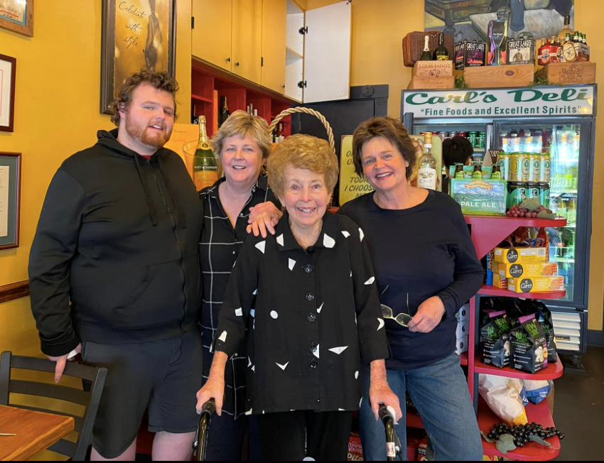 Former Carl's owner Joanie Holwadel, center, with her daughters Anne McManus, right, Lynn Arnold, left, and grandson Alex, far left. Holwadel died late last month at the age of 90.