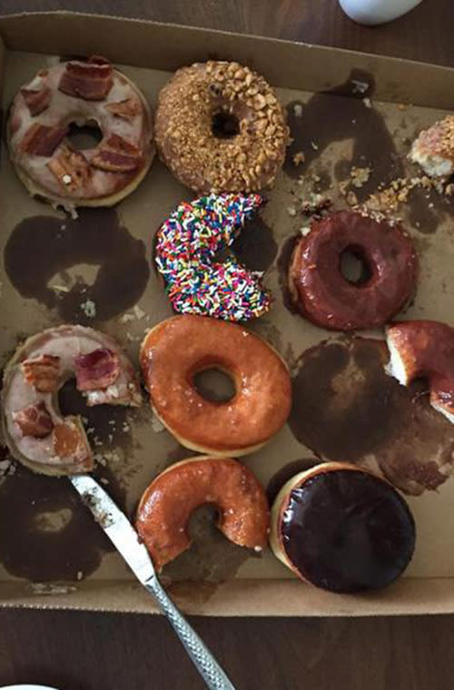 U2’s The Edge can’t commit to just one doughnut. A photo from their tour shows pieces of several varieties missing.