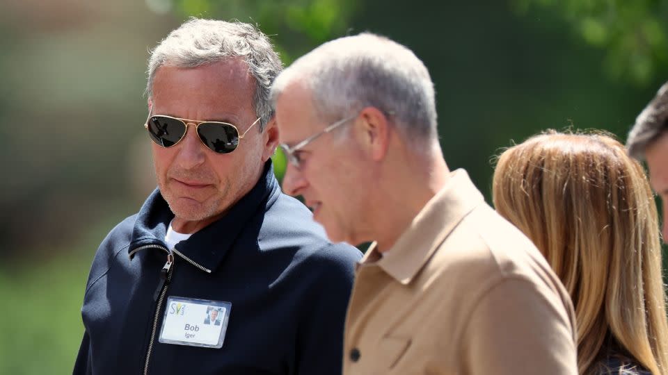 Bob Iger, CEO of Disney and one of the most recognizable business leaders on the planet, wore a name tag and aviators at last year's Sun Valley summit. - Kevin Dietsch/Getty Images