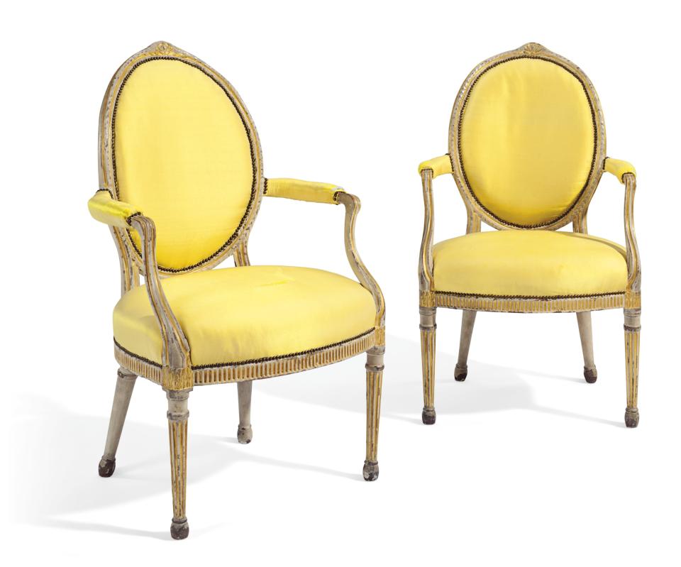 A pair of George III gray-painted and parcel-gilt armchairs, estimated at S3,000–$5,000 in the New York sale.